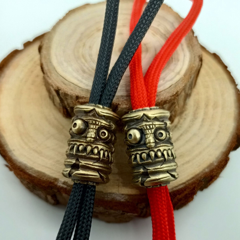 Paracord Survival Bracelet - Grin lantern Face Brass Knife Beads